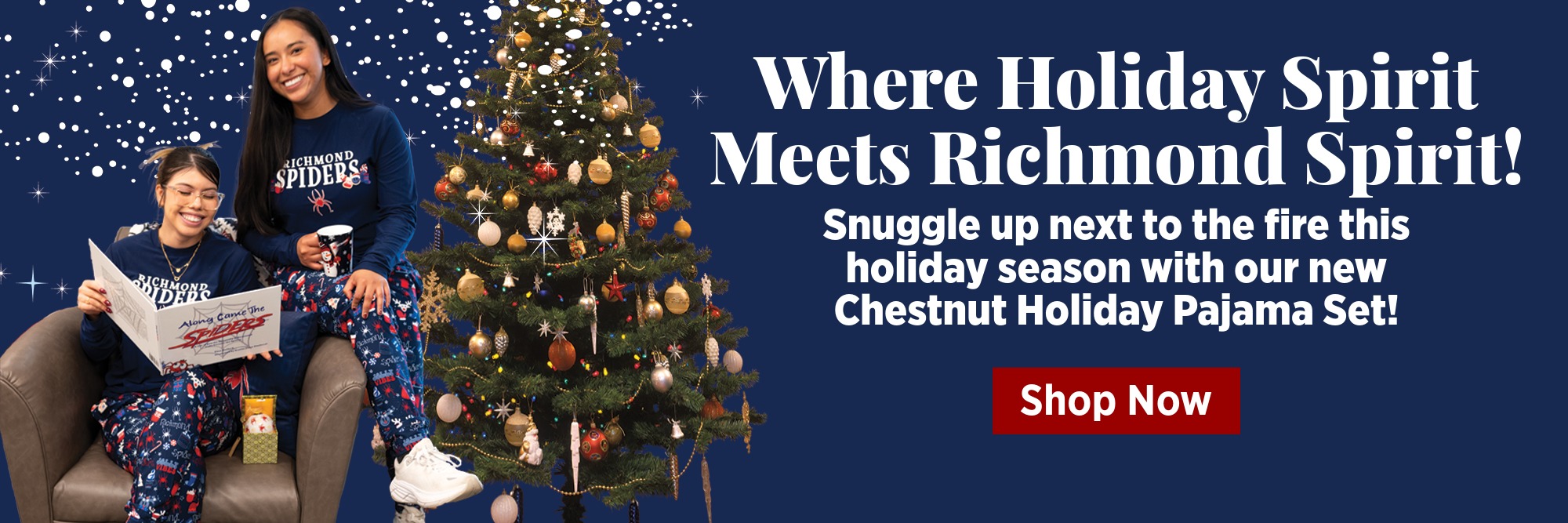 Two girls sitting in a chair reading a book together.